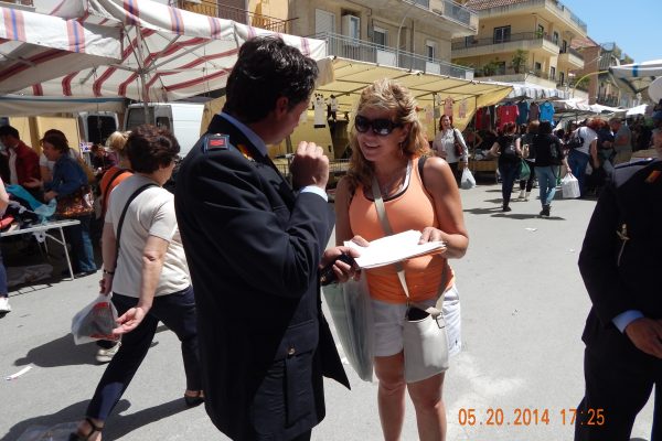 Jane getting directions in Canicatti, Sicily